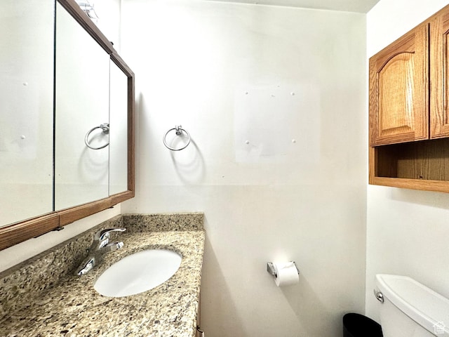 500 W Clark St S, Grantsville, UT 84029 - bathroom featuring toilet and vanity