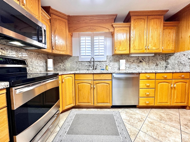 500 W Clark St S, Grantsville, UT 84029 - kitchen featuring a sink, appliances with stainless steel finishes, and tasteful backsplash