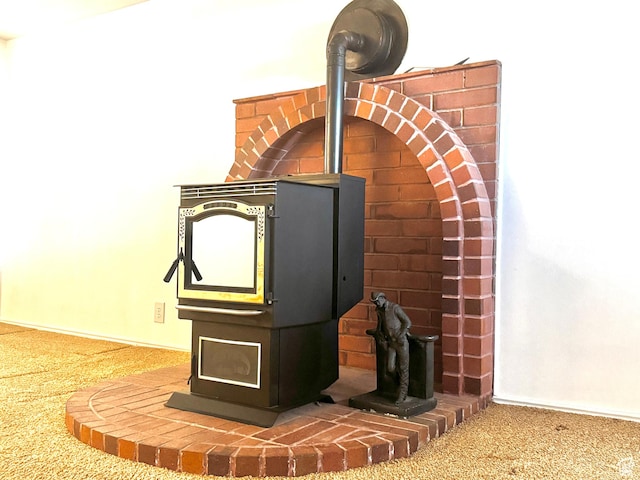 500 W Clark St S, Grantsville, UT 84029 - details featuring a wood stove and carpet flooring