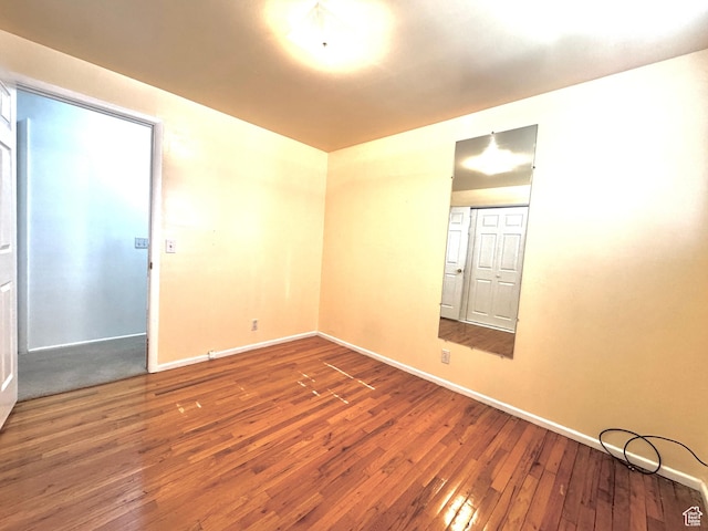 500 W Clark St S, Grantsville, UT 84029 - unfurnished room with baseboards and hardwood / wood-style flooring