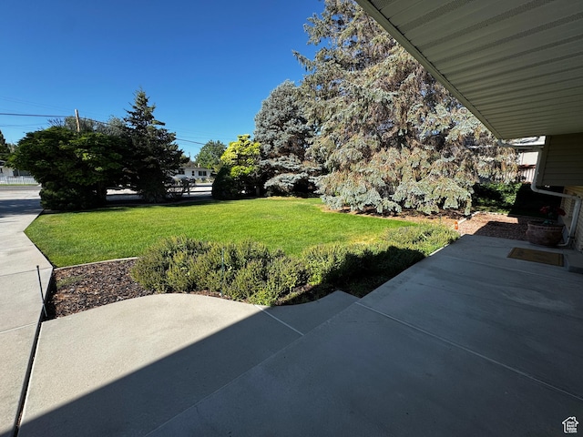 500 W Clark St S, Grantsville, UT 84029 - view of grassy yard with a patio