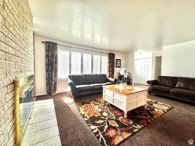 500 W Clark St S, Grantsville, UT 84029 - living area featuring dark colored carpet, baseboards, and a brick fireplace