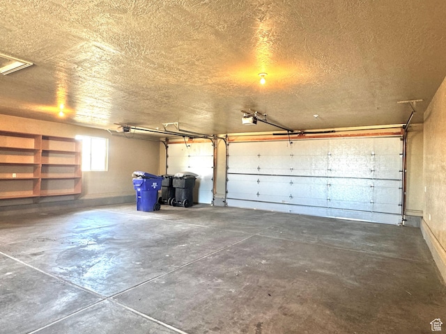 500 W Clark St S, Grantsville, UT 84029 - garage featuring a garage door opener