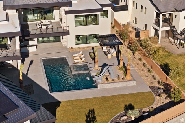 20 N Cliffside Dr, Washington, UT 84780 - outdoor pool with a fenced backyard and a patio