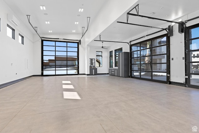 20 N Cliffside Dr, Washington, UT 84780 - interior space with a wall mounted air conditioner and baseboards