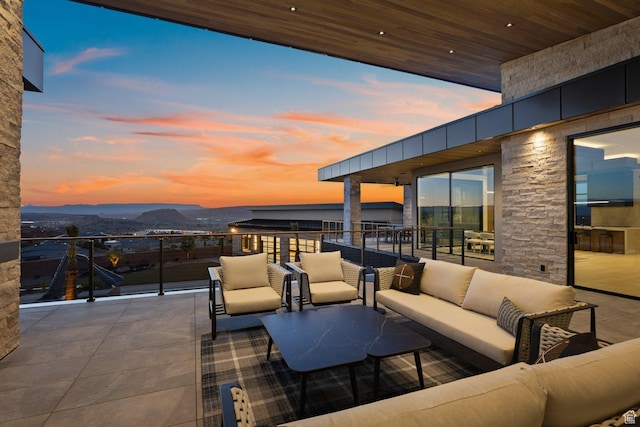 20 N Cliffside Dr, Washington, UT 84780 - patio terrace at dusk with a balcony and an outdoor living space