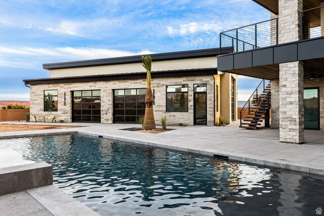 20 N Cliffside Dr, Washington, UT 84780 - outdoor pool with stairs and a patio area