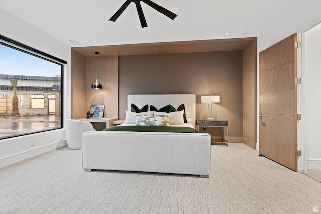 20 N Cliffside Dr, Washington, UT 84780 - bedroom featuring a ceiling fan, light carpet, and baseboards