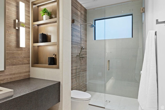 20 N Cliffside Dr, Washington, UT 84780 - bathroom featuring toilet, a stall shower, and built in shelves