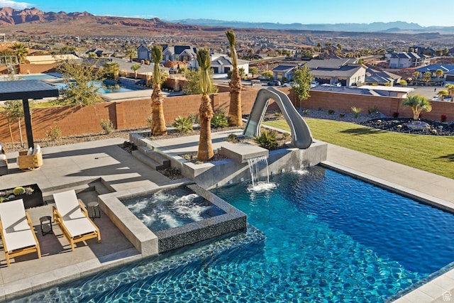 20 N Cliffside Dr, Washington, UT 84780 - view of pool featuring a water slide, a patio area, a residential view, and a mountain view