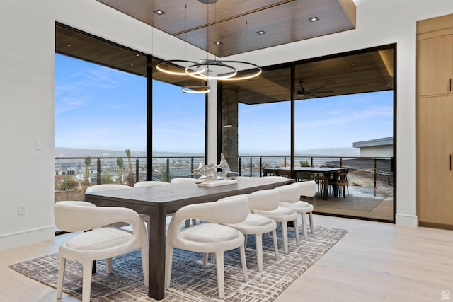 20 N Cliffside Dr, Washington, UT 84780 - dining space featuring baseboards, floor to ceiling windows, and light wood finished floors