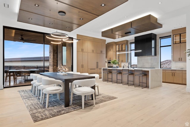 20 N Cliffside Dr, Washington, UT 84780 - dining space with a healthy amount of sunlight and light wood-style floors