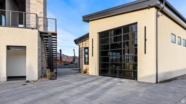20 N Cliffside Dr, Washington, UT 84780 - view of property exterior with stucco siding