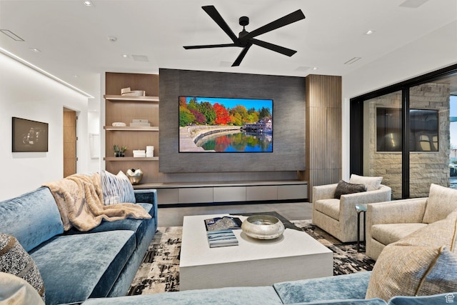 20 N Cliffside Dr, Washington, UT 84780 - home theater with an accent wall, ceiling fan, and built in features