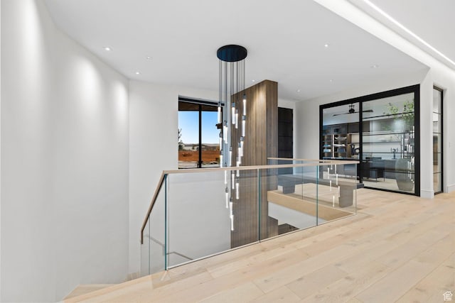 20 N Cliffside Dr, Washington, UT 84780 - corridor featuring recessed lighting, an upstairs landing, and wood finished floors