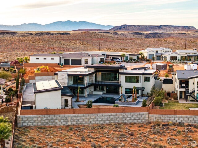 20 N Cliffside Dr, Washington, UT 84780 - back of house featuring a residential view and a mountain view