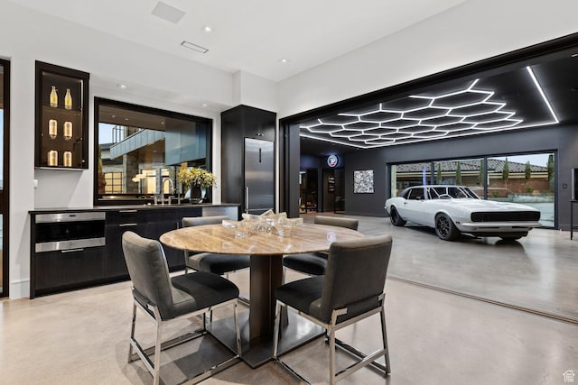 20 N Cliffside Dr, Washington, UT 84780 - dining space with finished concrete flooring and visible vents