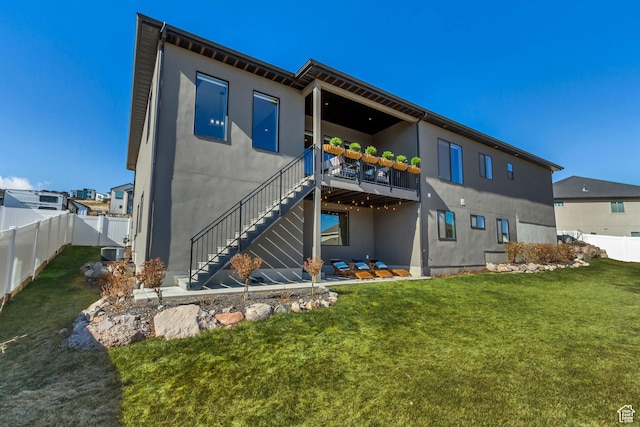 14203 S Brook Heights Cir W, Herriman, UT 84096 - back of property with a yard, a patio, and central air condition unit