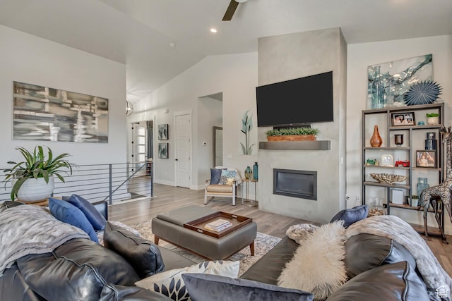 14203 S Brook Heights Cir W, Herriman, UT 84096 - living room with vaulted ceiling and light hardwood / wood-style flooring