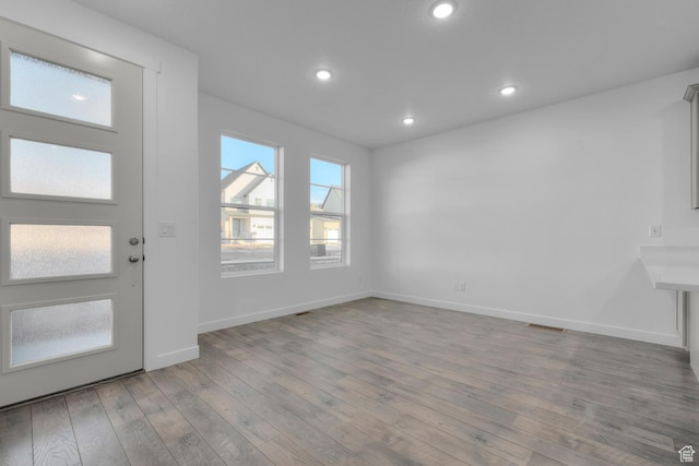 foyer with light wood-type flooring