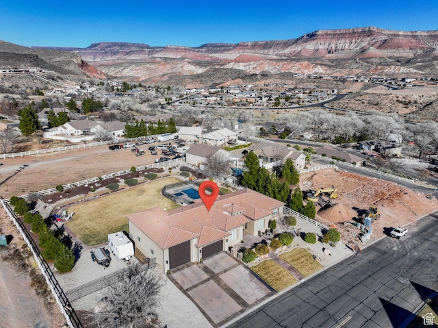 drone / aerial view featuring a mountain view