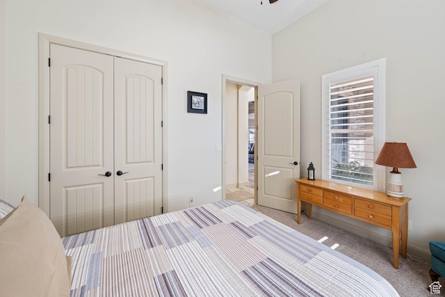 bedroom with a closet and carpet