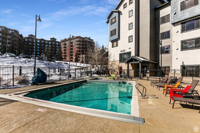 2669 N Canyons Resort Dr W Unit 205, Park City, UT 84098 - community pool with a view of city, fence, and a patio
