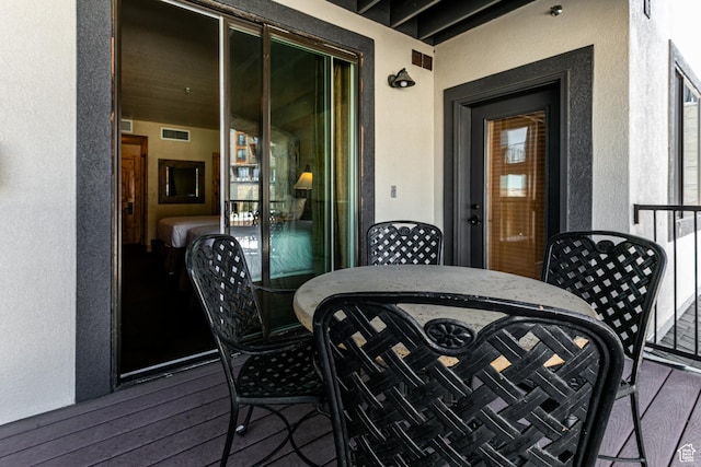 2669 N Canyons Resort Dr W Unit 205, Park City, UT 84098 - exterior space with outdoor dining area, visible vents, and stucco siding