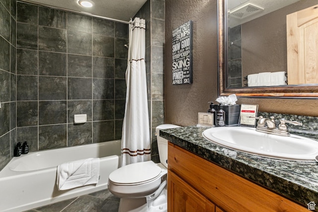 2669 N Canyons Resort Dr W Unit 205, Park City, UT 84098 - bathroom with visible vents, a textured wall, toilet, shower / bath combo, and vanity