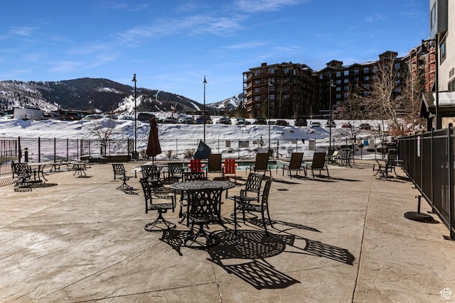 2669 N Canyons Resort Dr W Unit 205, Park City, UT 84098 - snow covered patio with a mountain view and fence
