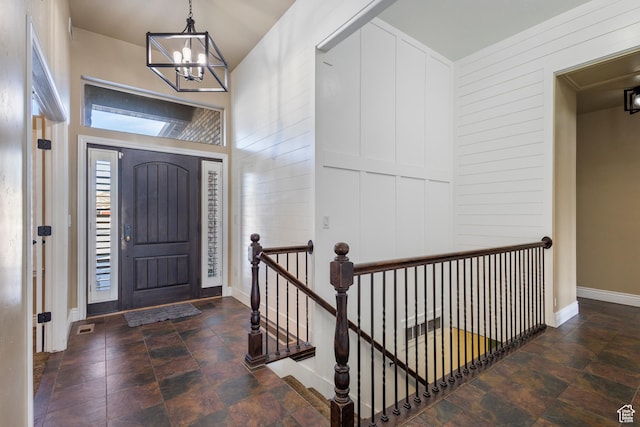 11513 S Jackson Downs Way S, Jordan, UT 84095 - entrance foyer with a notable chandelier and wooden walls