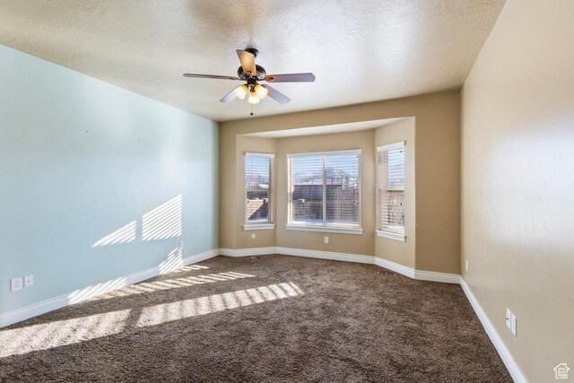 11513 S Jackson Downs Way S, Jordan, UT 84095 - carpeted spare room featuring a textured ceiling and ceiling fan