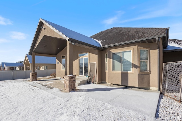 11513 S Jackson Downs Way S, Jordan, UT 84095 - rear view of house with a patio
