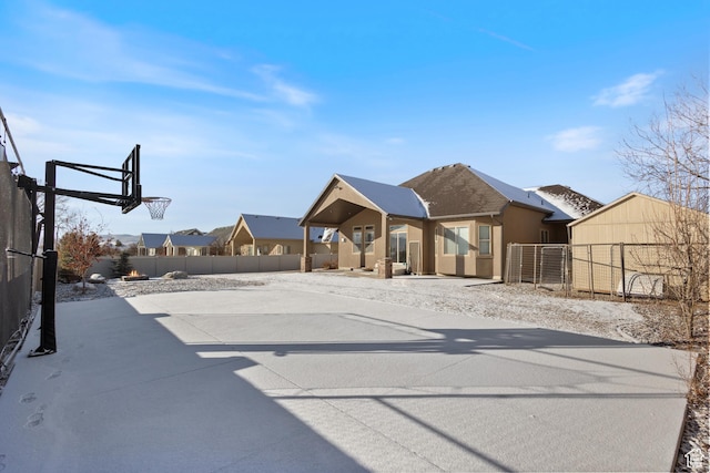 11513 S Jackson Downs Way S, Jordan, UT 84095 - exterior space featuring basketball hoop