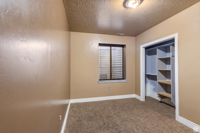 11513 S Jackson Downs Way S, Jordan, UT 84095 - unfurnished bedroom with carpet flooring and a textured ceiling