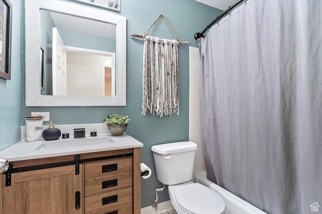 full bathroom with vanity, shower / tub combo with curtain, and toilet