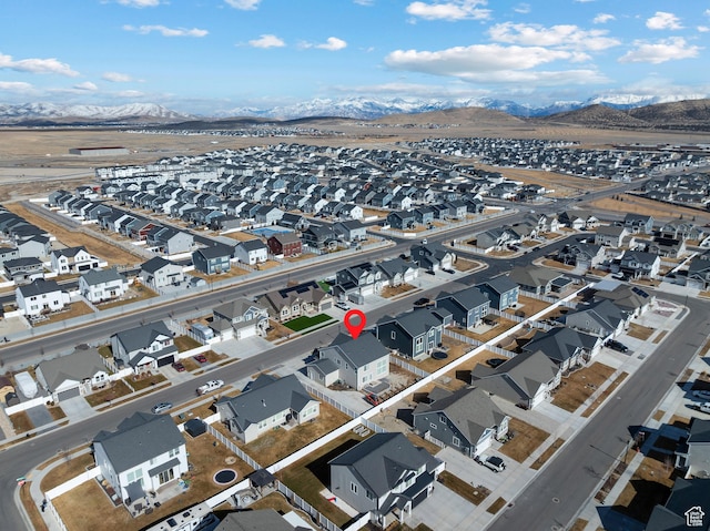bird's eye view featuring a residential view and a mountain view
