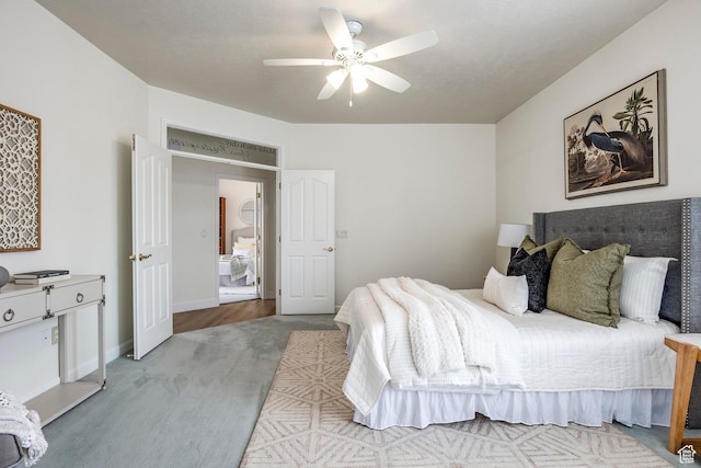 carpeted bedroom with ceiling fan
