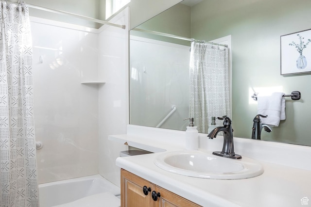 bathroom with vanity and shower / bath combo