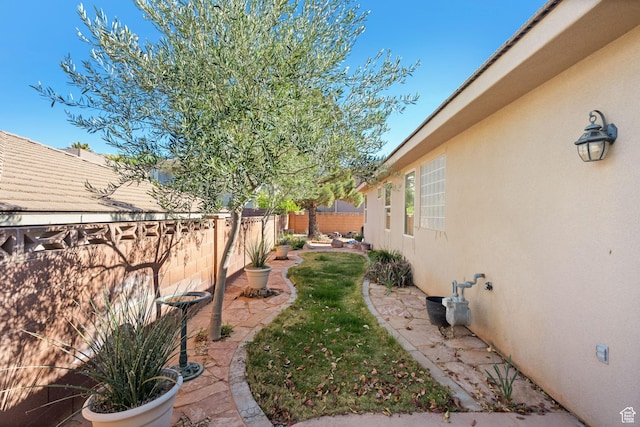 3523 S Desert Hills Dr, St George, UT 84790 - view of yard featuring a patio and a fenced backyard