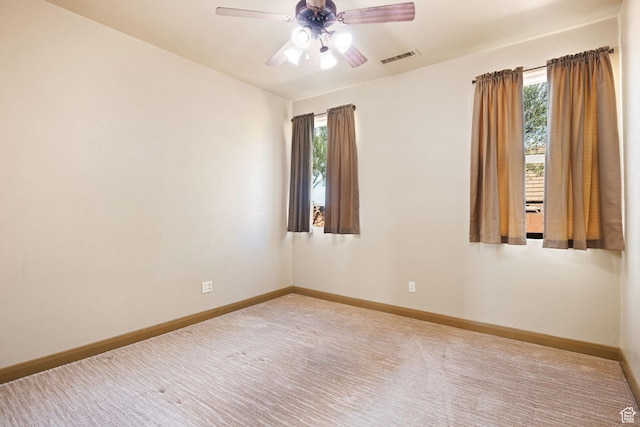 3523 S Desert Hills Dr, St George, UT 84790 - empty room featuring visible vents, baseboards, a ceiling fan, and a healthy amount of sunlight