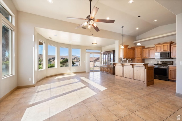 3523 S Desert Hills Dr, St George, UT 84790 - kitchen with pendant lighting, a breakfast bar, light tile patterned flooring, stainless steel appliances, and open floor plan