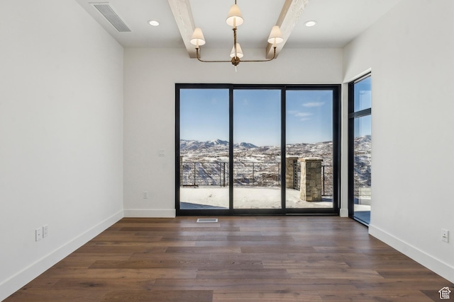2738 Longspur Ln, Park City, UT 84098 - unfurnished room featuring dark hardwood / wood-style flooring, a mountain view, beamed ceiling, and an inviting chandelier