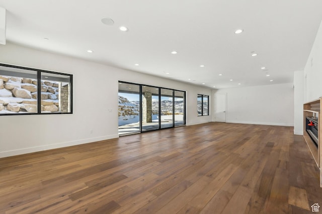 2738 Longspur Ln, Park City, UT 84098 - unfurnished living room featuring dark wood-type flooring