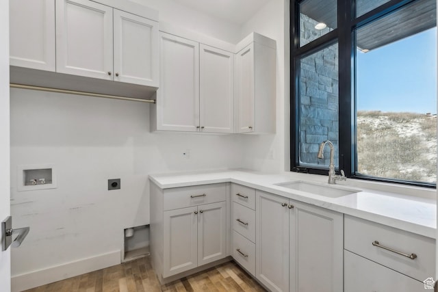 2738 Longspur Ln, Park City, UT 84098 - laundry area with sink, cabinets, light wood-type flooring, hookup for a washing machine, and hookup for an electric dryer