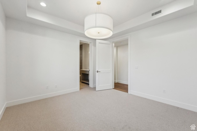 2738 Longspur Ln, Park City, UT 84098 - spare room featuring light colored carpet and a tray ceiling