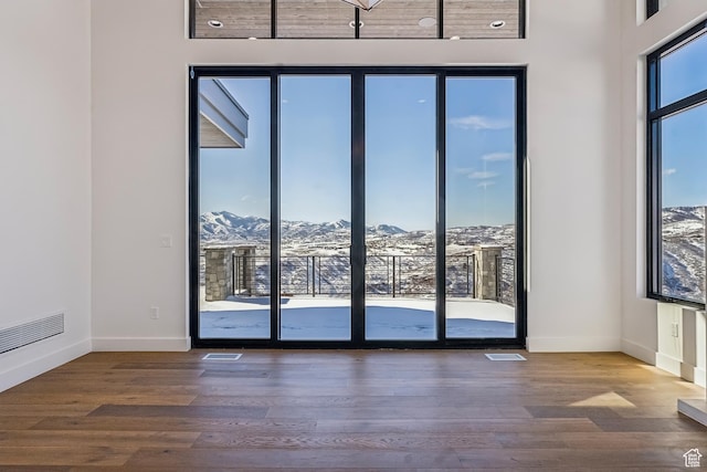 2738 Longspur Ln, Park City, UT 84098 - interior space with a mountain view, hardwood / wood-style flooring, and a healthy amount of sunlight