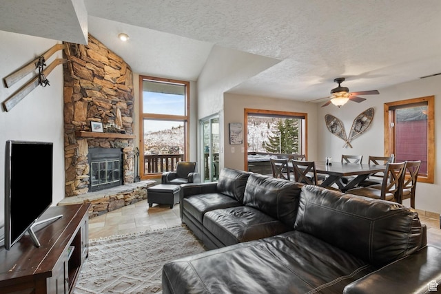 236 Norfolk Ave, Park City, UT 84060 - living room with ceiling fan, a stone fireplace, and a textured ceiling