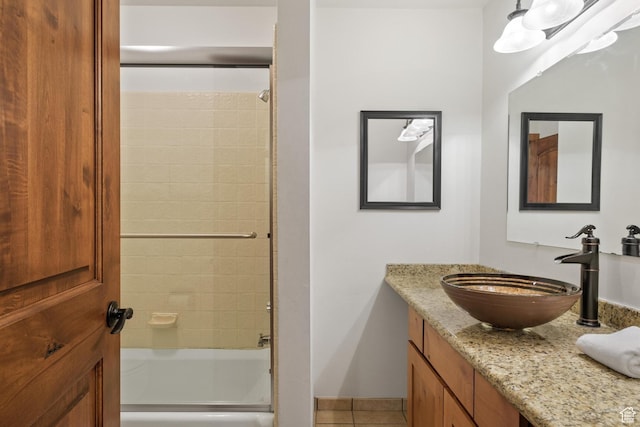 236 Norfolk Ave, Park City, UT 84060 - bathroom featuring tiled shower / bath, vanity, and tile patterned flooring