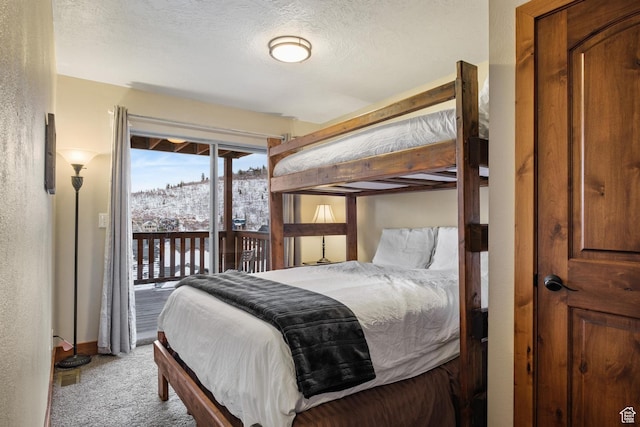 236 Norfolk Ave, Park City, UT 84060 - carpeted bedroom with a textured ceiling and access to outside
